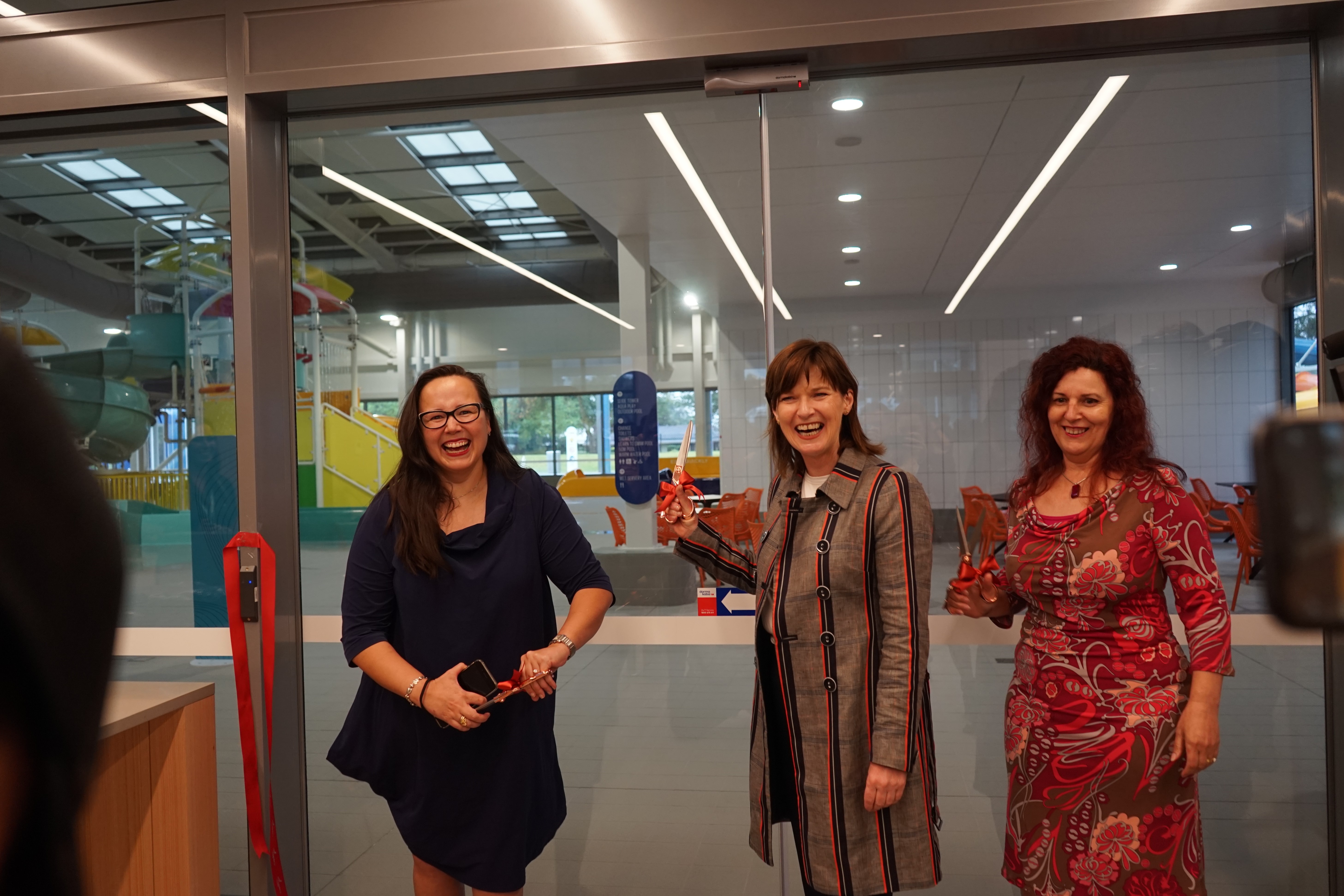 Harriet Shing MP, Mary-Anne Thomas MP and Cr Sharon Gibson cut the ribbon on the official opening of the GRAC